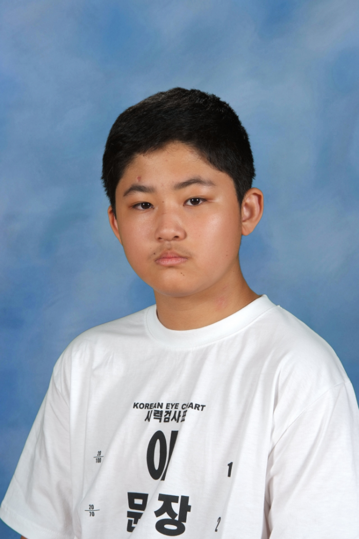 Hong's 8th grade school picture, taken in September 2013. 