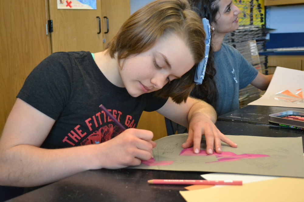 Brooklin working on a drawing during art. Photo by Emily Lu