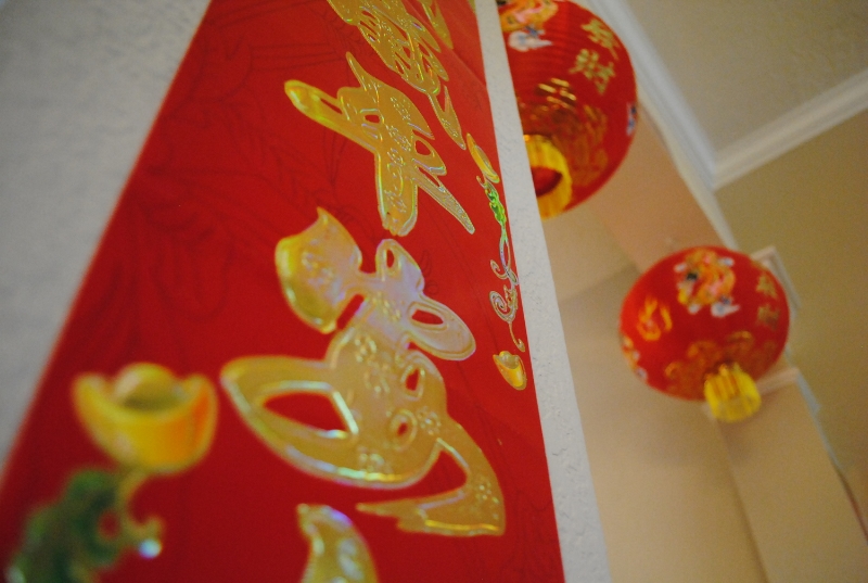 Red lanterns and decorations are hung to ward off evil spirits. Photo by Alice Zhang