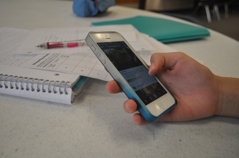 Using your phone while doing homework can lead to procrastination. Photo by Emily Lu