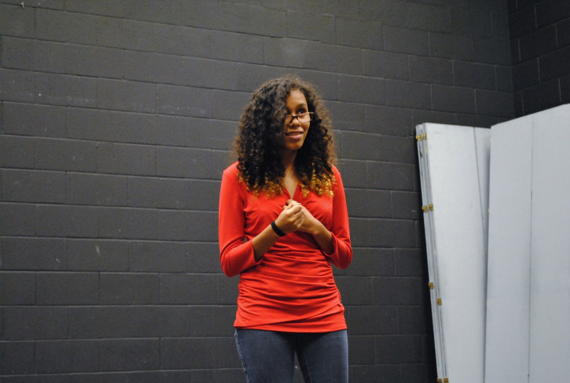 8th grader Larissa Marks, stands onstage auditioning for Macbeth. Photo by George Ruhlman