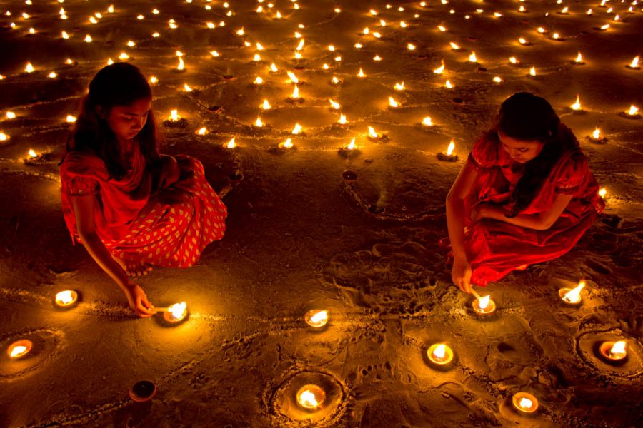 Diwali in India involves alot of lights, hence the name. These lights are called diyas. It is believed that deceased relatives come back to visit their families on Earth during this festival and the lights are a way to guide the spirits home. (Sort of like day of the dead.)