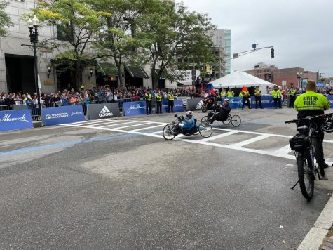 Wheelchairs in the last turn of the race.