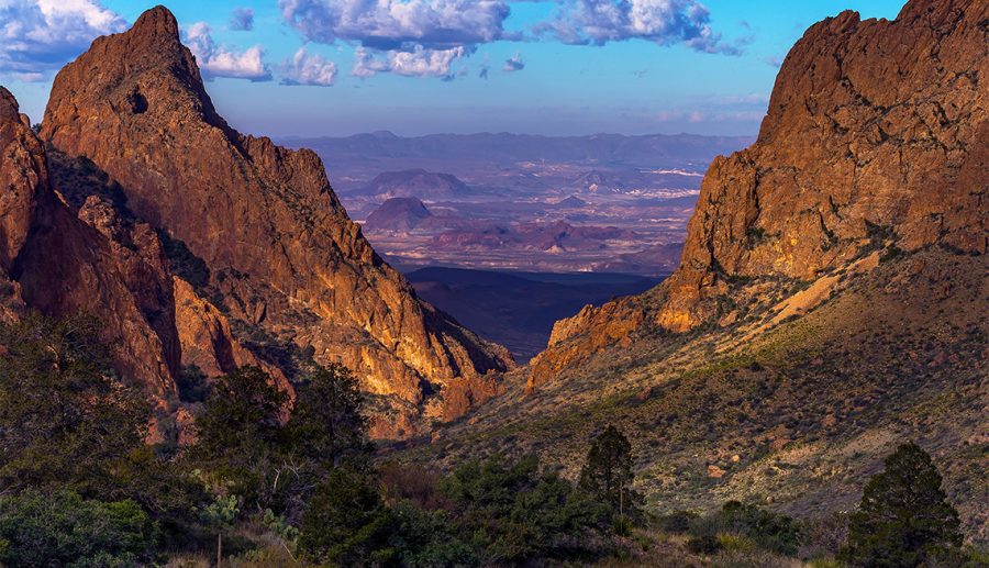 Look at the distant Chihuahuan Desert through a gap in the Chisos Mountains nicknamed the Window