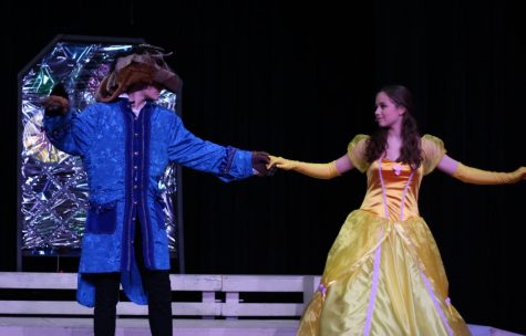 Anna Bruce (8) as Belle dancing with Brandon Jones (8) as the Beast.