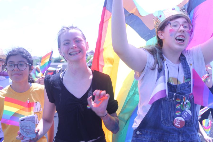 Students celebrating during the Pride parade.