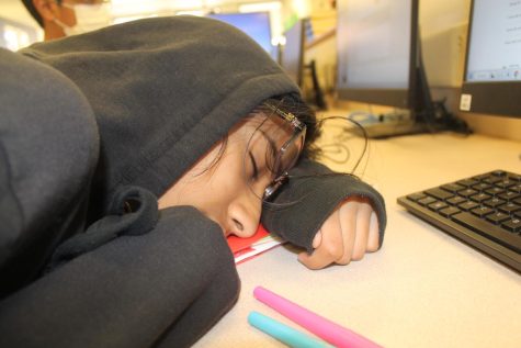A student sleeping in class.