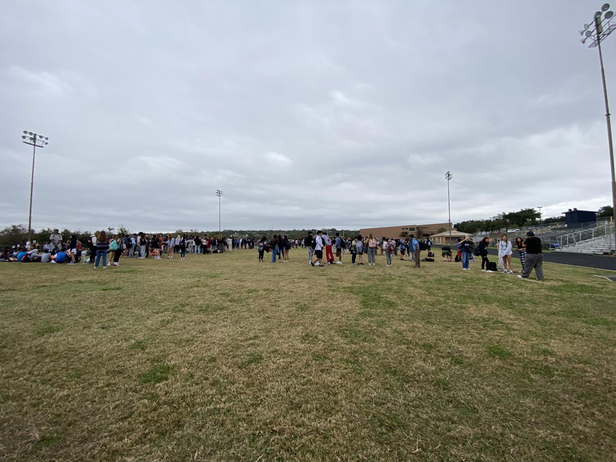 Canyon Vista staff and students gather on the field during the second fire alarm.