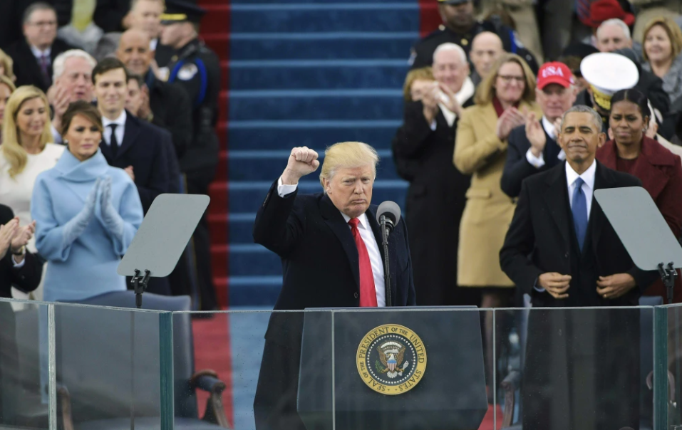 Trump raising his hand in triumph at inauguration